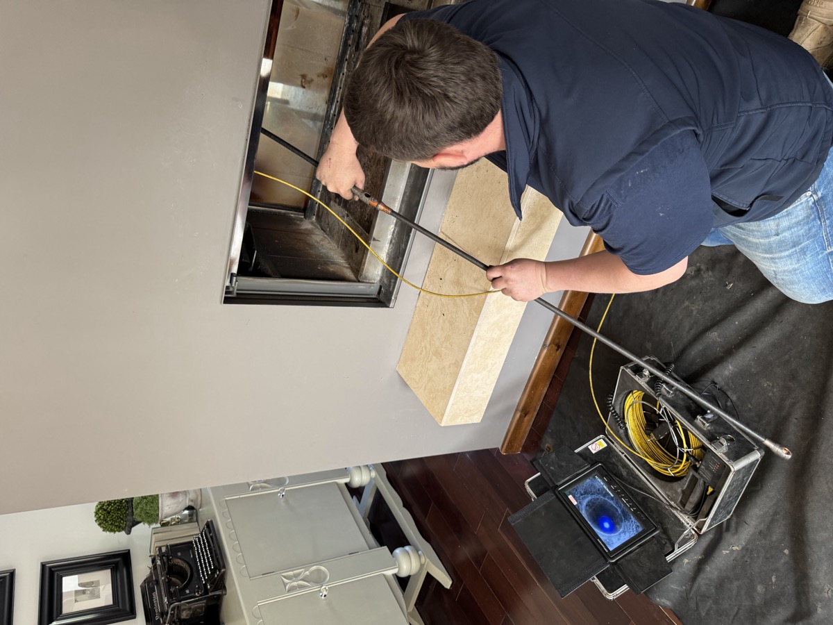 Jonathon Roberts performing CCTV chimney inspection