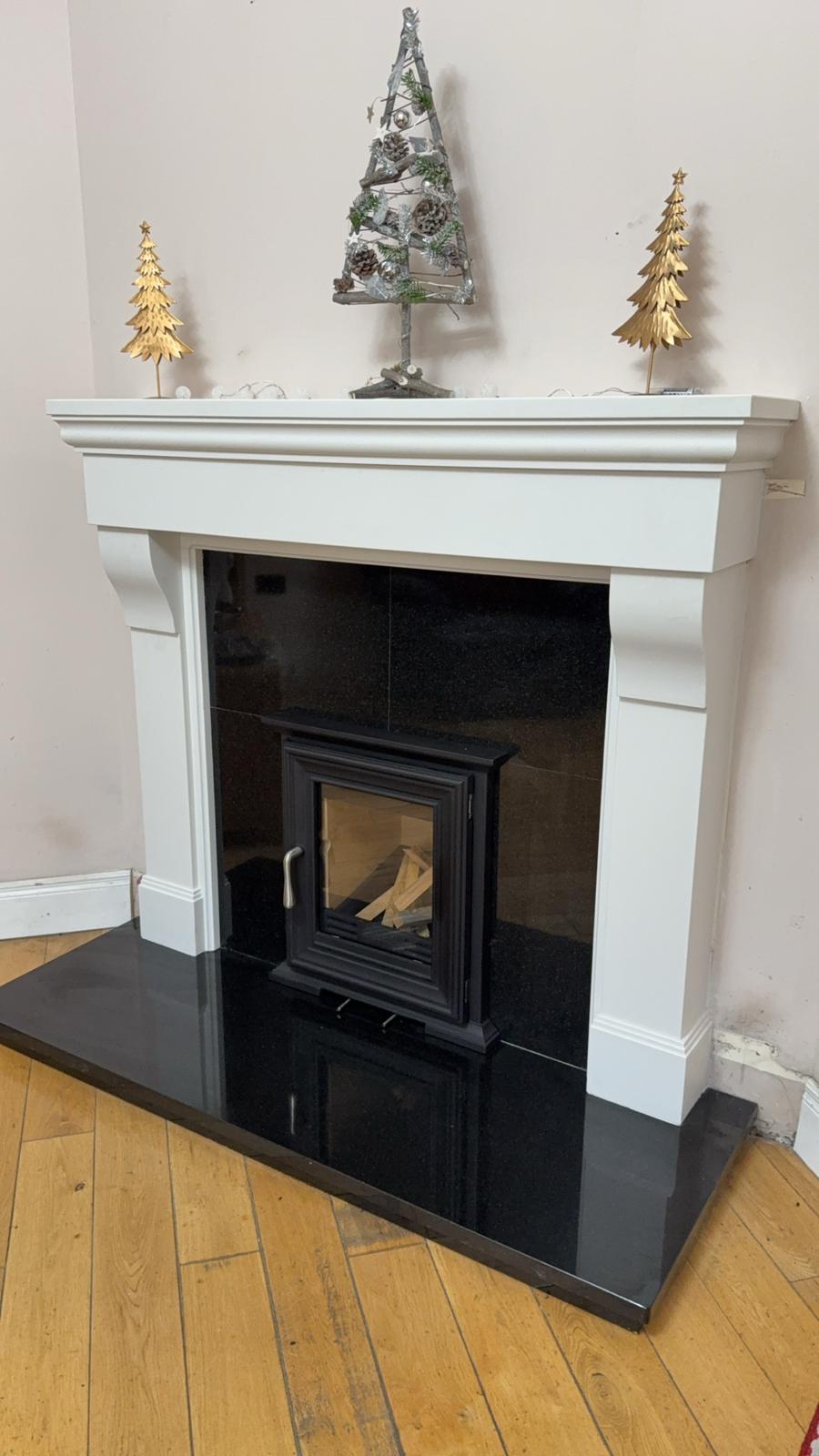 Stove installation with Christmas mantel decorations