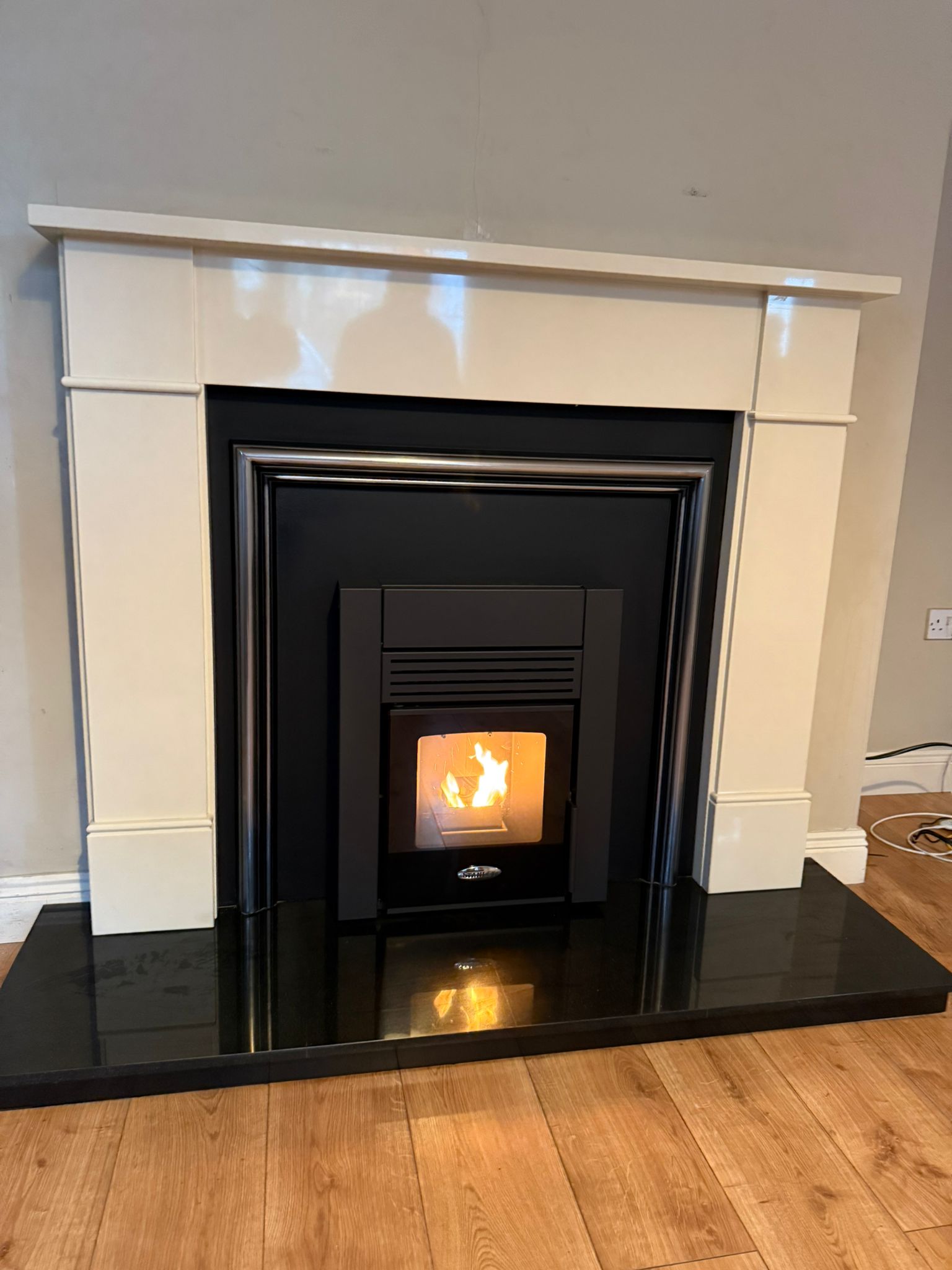 Pellet stove installation with fire lit